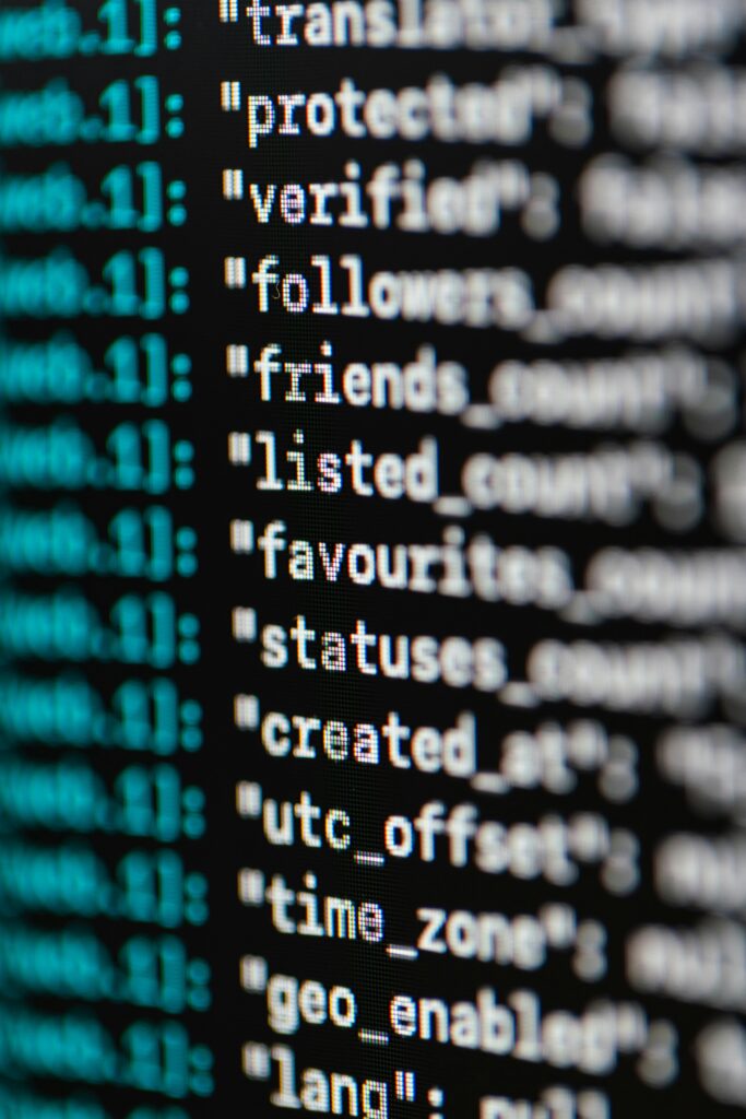 pexels-photo-3861976-3861976 Extreme close-up of computer code displaying various programming terms and elements.